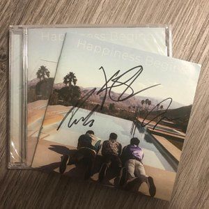 Autographed Jonas Brothers CD (Happiness Begins) - authentic signed album insert